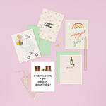 A charming array of beautifully illustrated baby shower cards in various styles, from heartfelt to humorous, for celebrating the upcoming arrival of a baby.