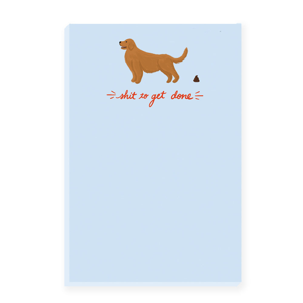 A notepad with a humorous illustration of a pooping golden retriever at the top and the text 'Get Shit Done.' The notepad combines humor with productivity in a lighthearted way. 🐕 💩📝😄