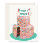 An adorably illustrated birthday card featuring a multi-tiered birthday cake. The cake is colorfully decorated with and topped with candles. The card reads '...and many more. 