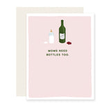 A humorous baby card with the message 'Moms need bottles too,' featuring a simple illustration of a bottle of red wine next to a baby bottle, adding a playful touch to the card's sentiment.