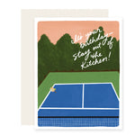A vibrant birthday card with a pickleball court illustration. The card reads: 'It's your birthday- stay out of the kitchen.' Ideal for pickleball enthusiasts and playful birthday wishes.