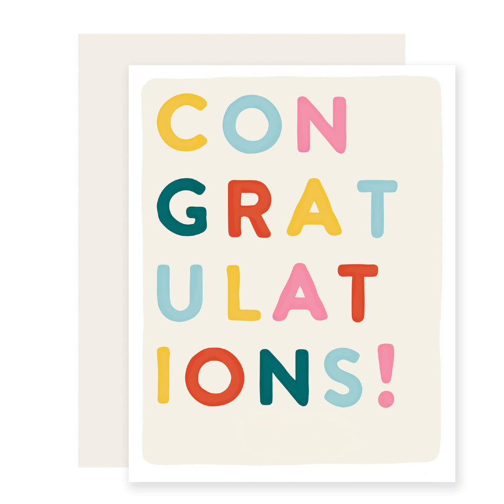 A simple yet colorful congratulations  card with a cream background. It features bold block letters spelling out 'Congratulations' in a vibrant, eye-catching style. The design is bright and cheery, perfect for sending joyful congrats!