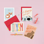 A diverse collection of beautifully illustrated love cards, ranging from playful to heartwarming, perfect for expressing love and catering to various emotions. 