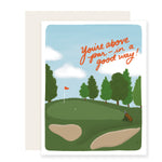 A Father's Day card adorned with a vibrantly illustrated golf course scene. The card features playful typography that reads 'Your above par – in a good way,' adding a touch of humor and warmth. Perfect for dads who love golf and appreciate a heartfelt pun.
