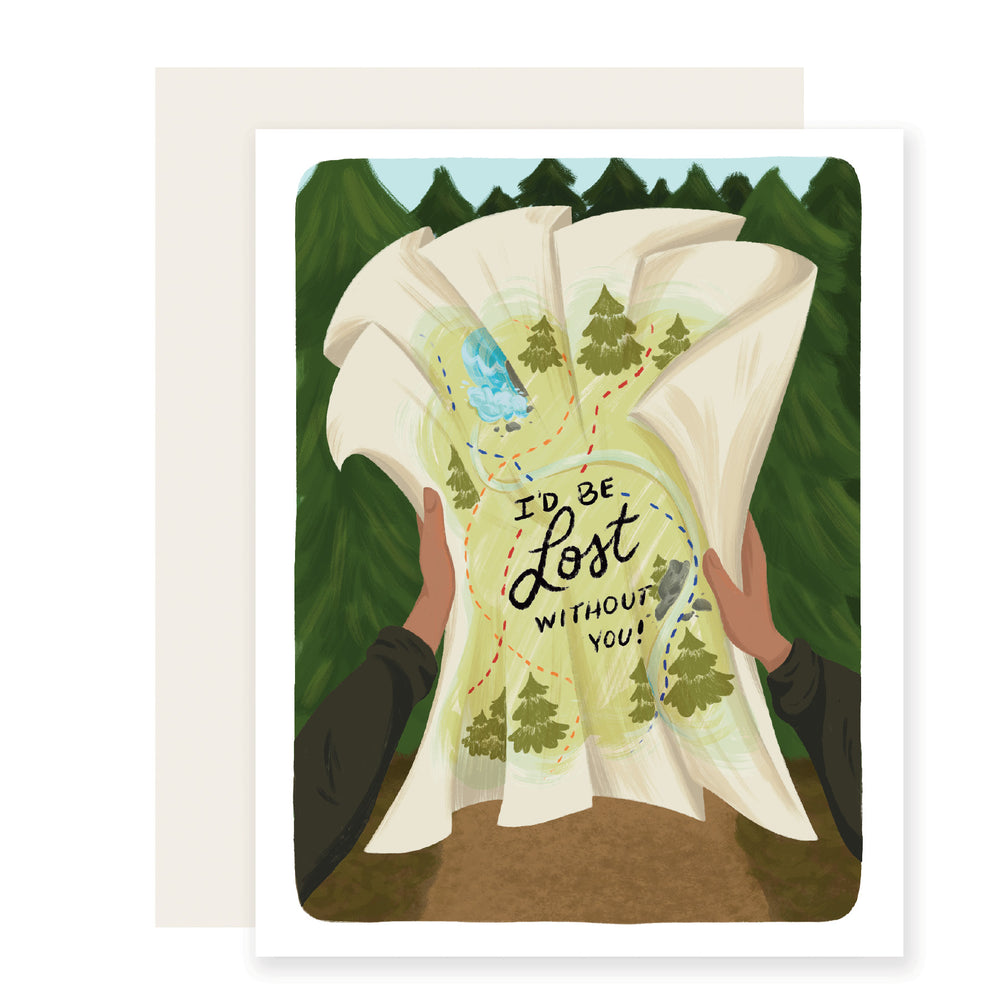 A card with the message 'I'd be lost without you.' The card features colorful and detailed artwork of a forest background, with hands holding an open map. The card conveys the sentiment that you would be lost without the recipient.