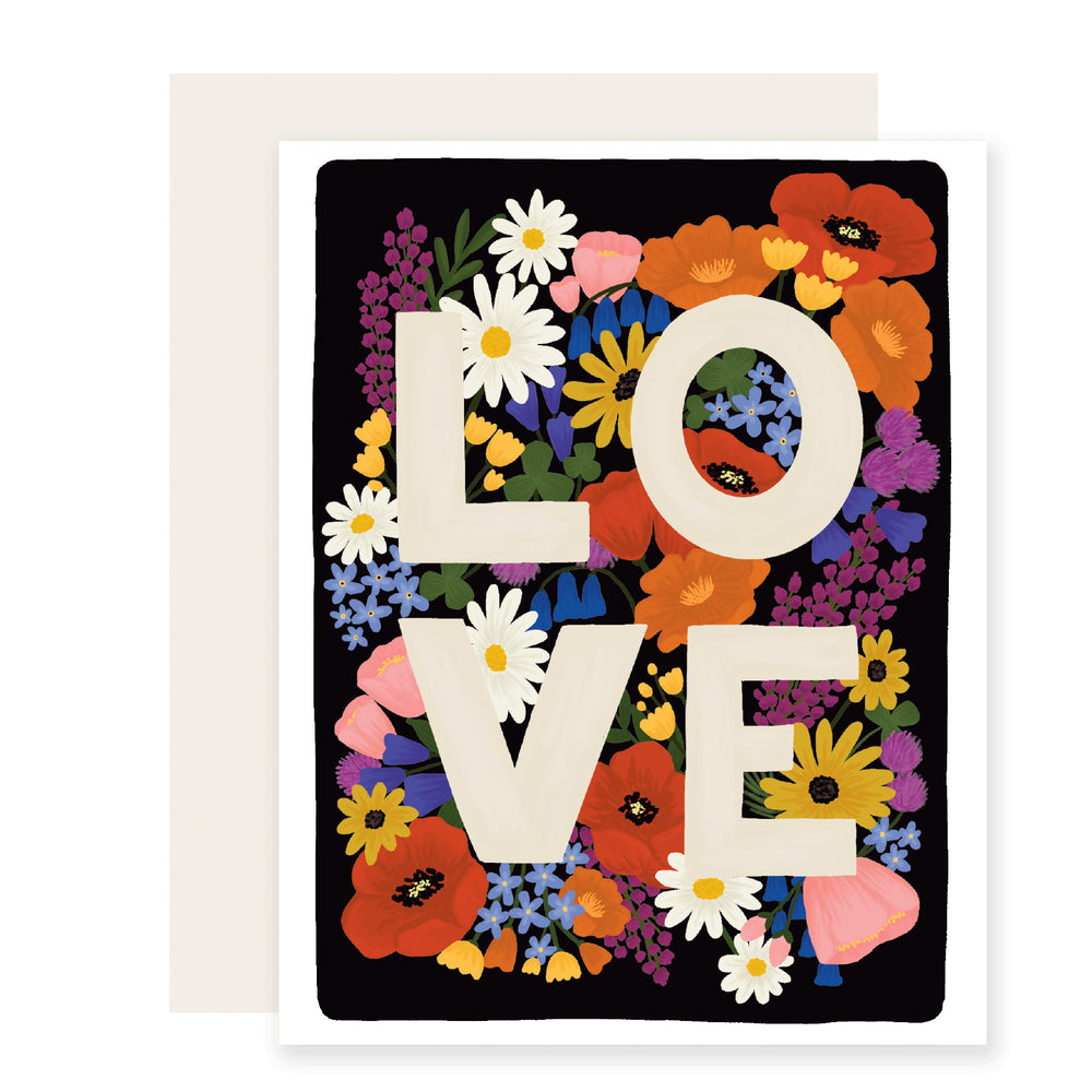 A card with the word 'LOVE' surrounded by exquisitely illustrated, vividly colorful wildflowers, creating a vibrant and heartfelt message.