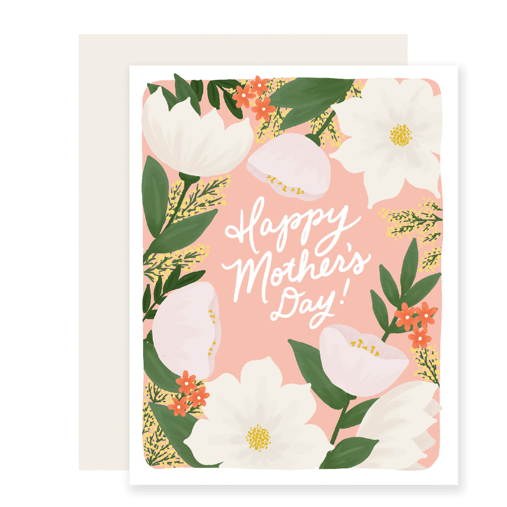 A light pink/peach Mother's Day card with elegant script reading 'Happy Mother's Day.' It features stunning illustrations of white flowers, green stems, delicate orange flowers, and small yellow flowers creating a beautiful and vibrant floral arrangement.