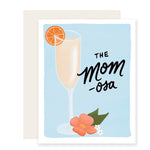 A Mother's Day card with a light blue background, featuring the text 'The Mom-osa.' Illustrated on the card is a mimosa in a champagne flute with an orange slice and beautiful flowers at the base.
