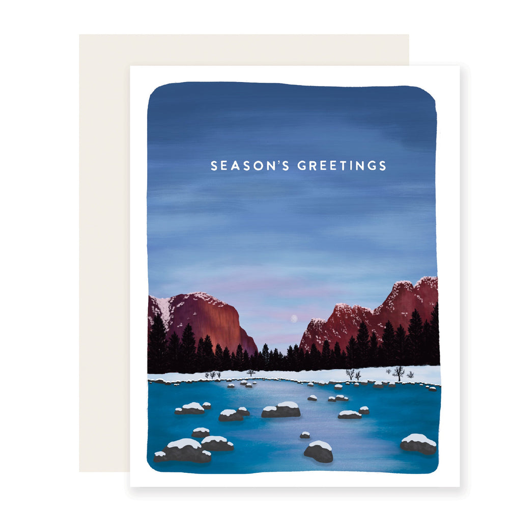 A beautifully illustrated holiday card that reads 'Season's Greetings'. The card features a snowy depiction of Yosemite, perfectly capturing the serene beauty of the winter season in this iconic national park.