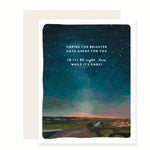 A beautifully illustrated sympathy card that reads Hoping for brighter days ahead for you. (And I'll be right here while it's dark). The illustration features a tranquil night sky, stunning stars, a river & rolling hills landscape, offering comfort.