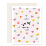 Charmingly illustrated Palentine's Day card featuring a light pink background, adorned with iconic Valentine's conversation heart candy. The text joyfully declares, 'Happy Palentine's Day'. 