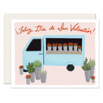 Charmingly illustrated card depicting a delightful truck selling vibrant flowers, with the message 'Feliz Día de San Valentín'—perfect for expressing love and sharing joy with your special someone on Valentine's Day.