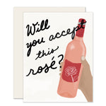 Adorable card with an illustrated hand offering a bottle of rosé, asking 'Will you accept this rose?' Perfect for fans of The Bachelor, Bachelorette, or wine enthusiasts.