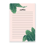 A simple, elegant, and cute notepad with light pink paper, lined for easy writing. The borders are adorned with beautifully illustrated banana leaves, adding a charming touch to the design.
